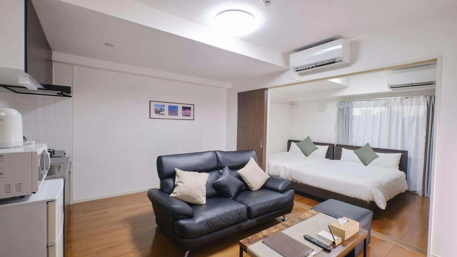 오키나와 본섬 코랄 게이트 인 쿠메 3성급 게스트하우스 스위트룸