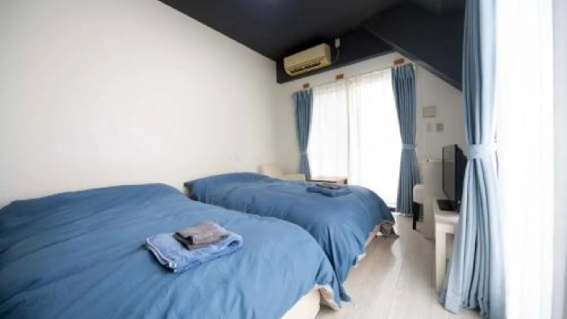 오키나와 본섬 Exsaison Chatan 2성급 게스트하우스 전망