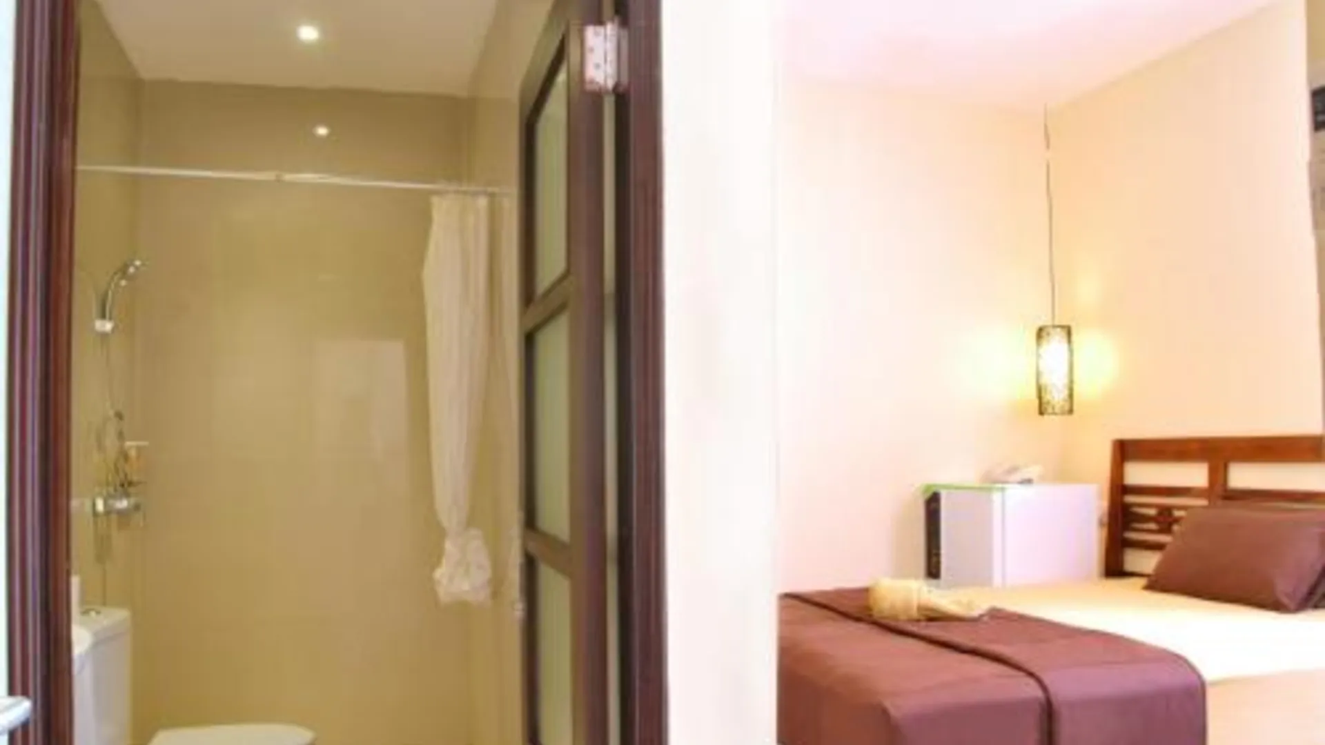 발리 쿠타 사리 하우스 2성급 호텔 스위트룸