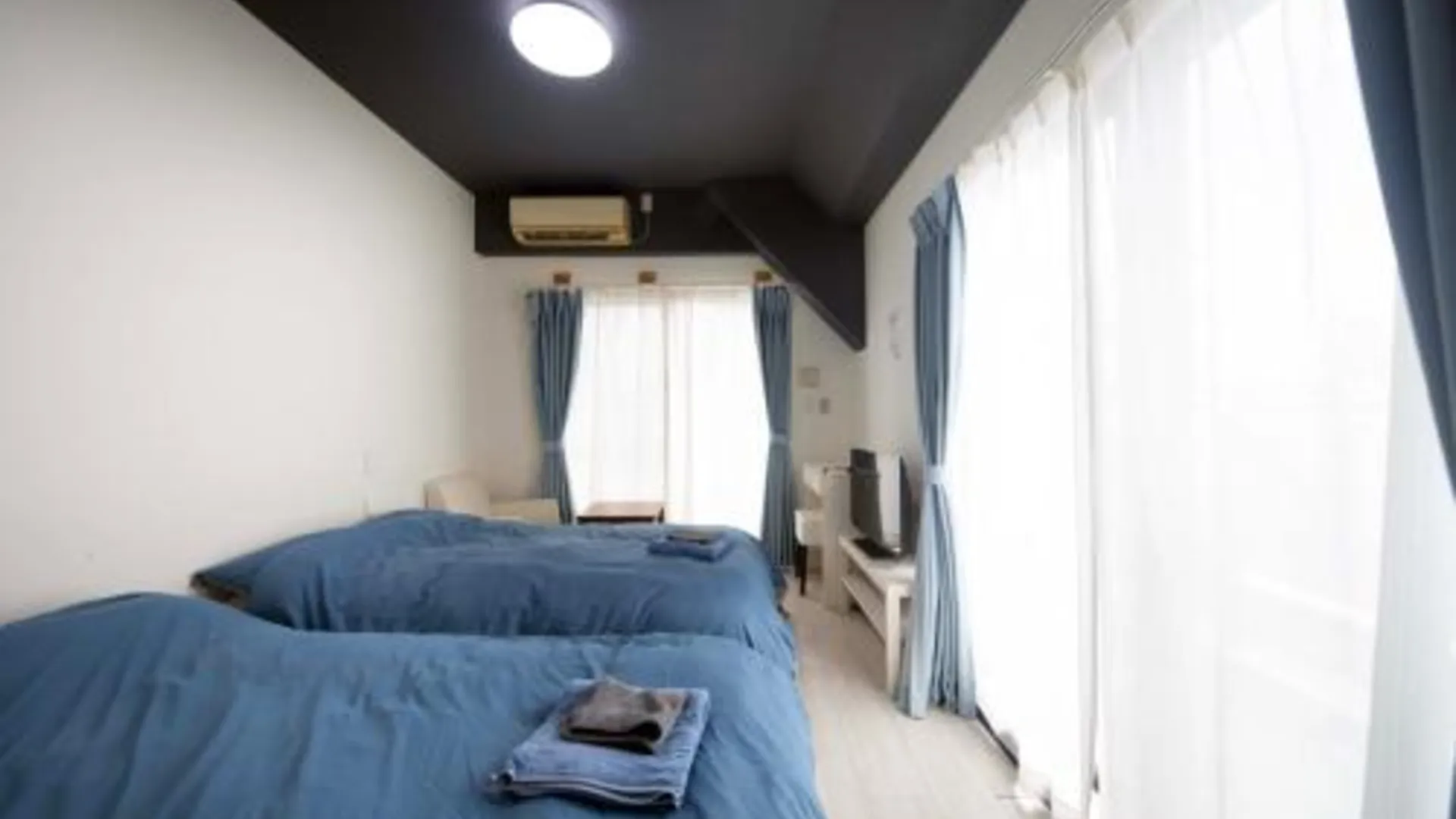 오키나와 본섬 Exsaison Chatan 2성급 게스트하우스 스위트룸