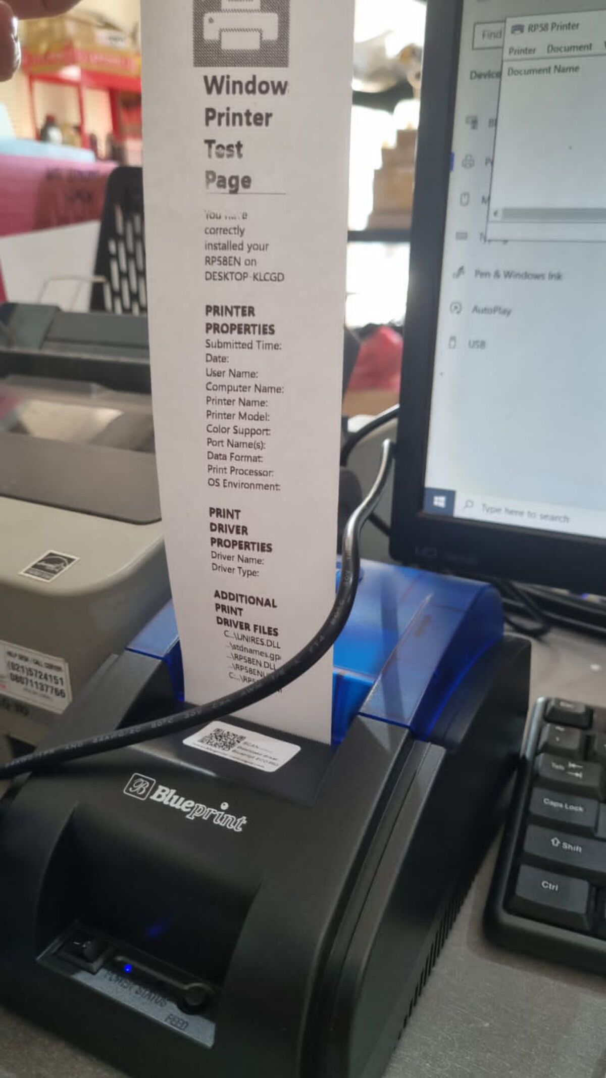 melakukan test print dari menu windows