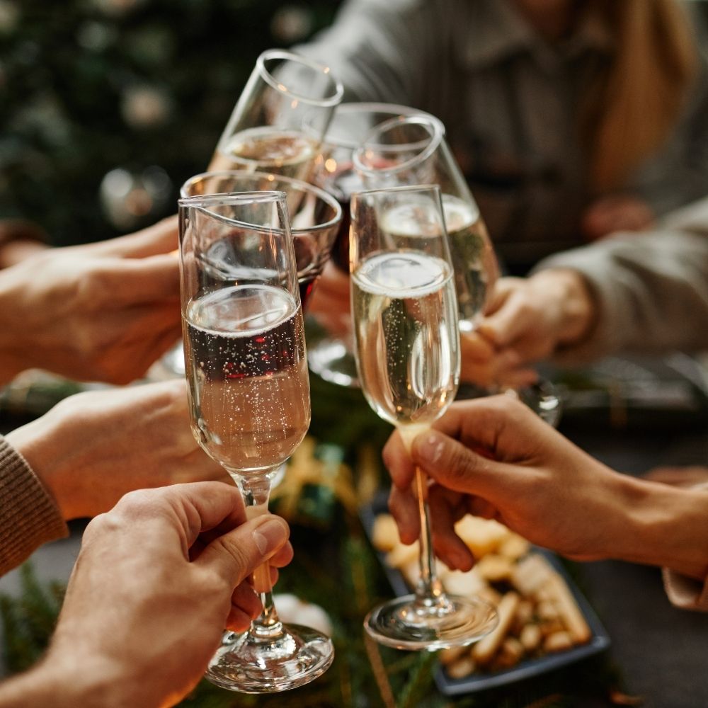 Colleagues raising champagne glasses in a toast