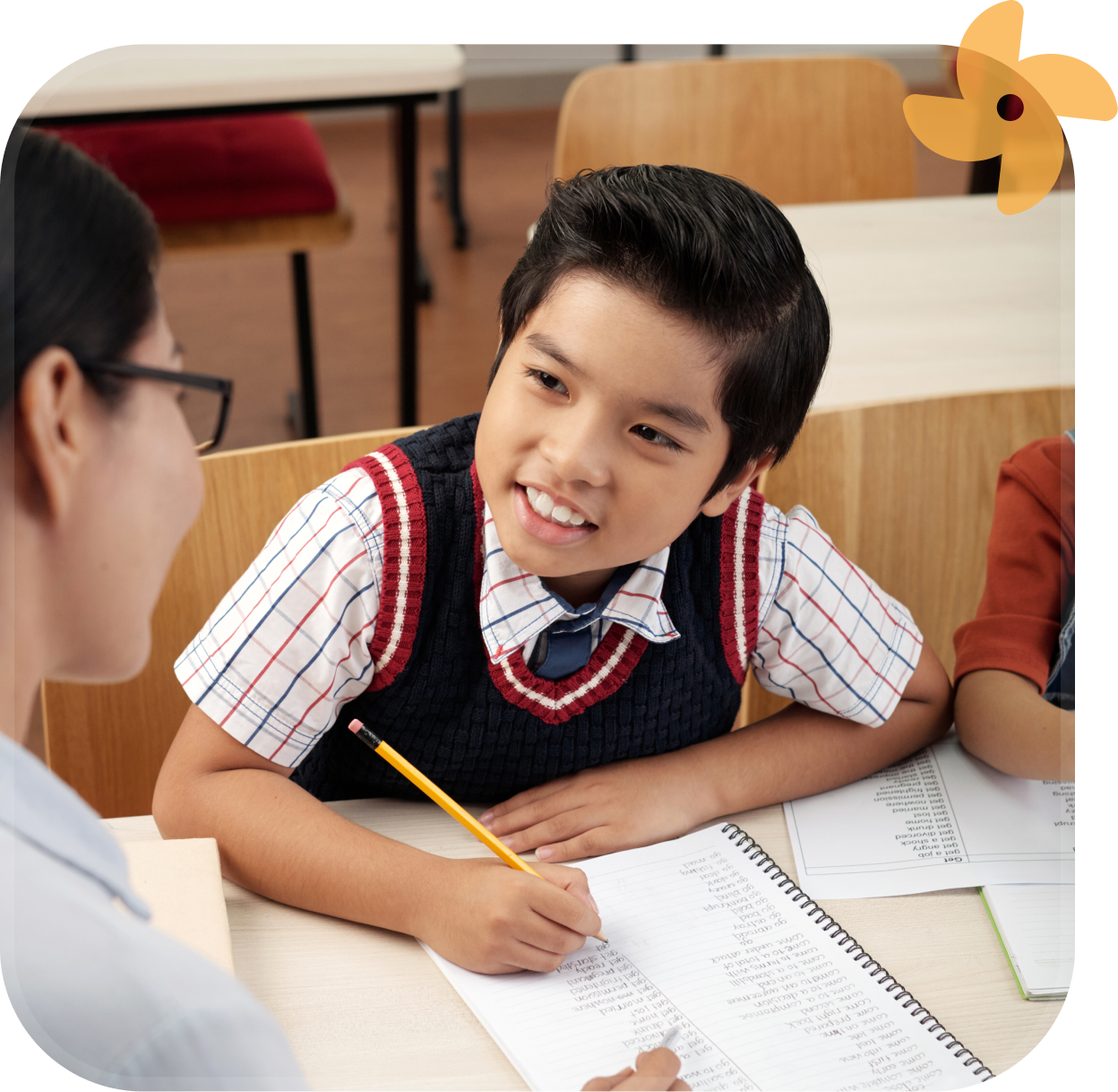 Teacher guiding a student