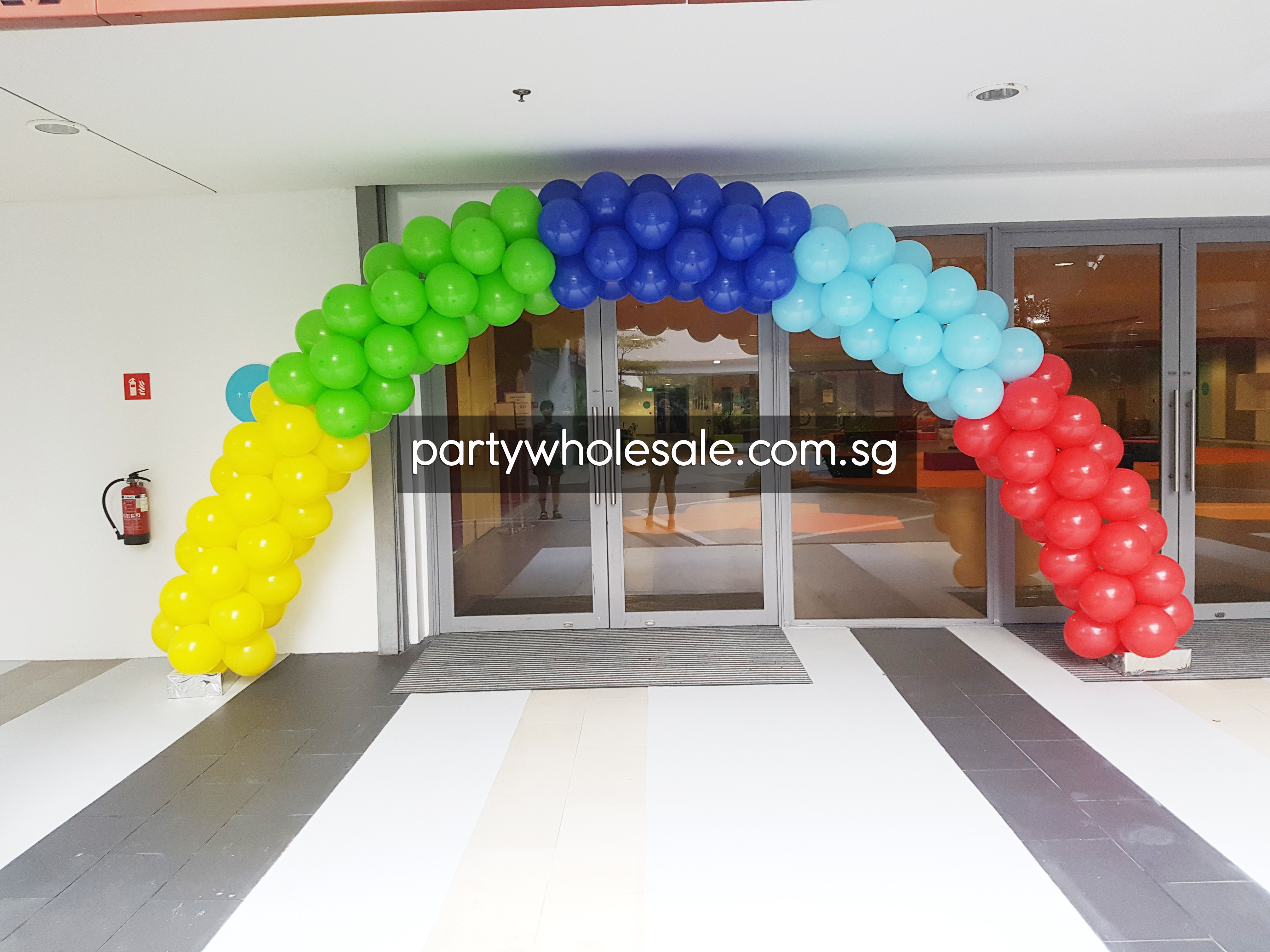 Rainbow balloon arch decor