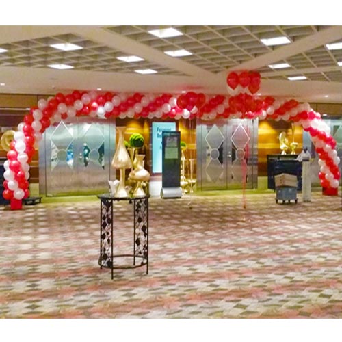 Giant carnival rainbow balloon arch
