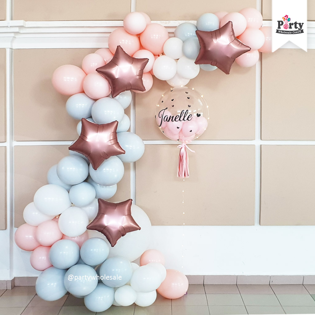 Pastel pink organic balloon arch