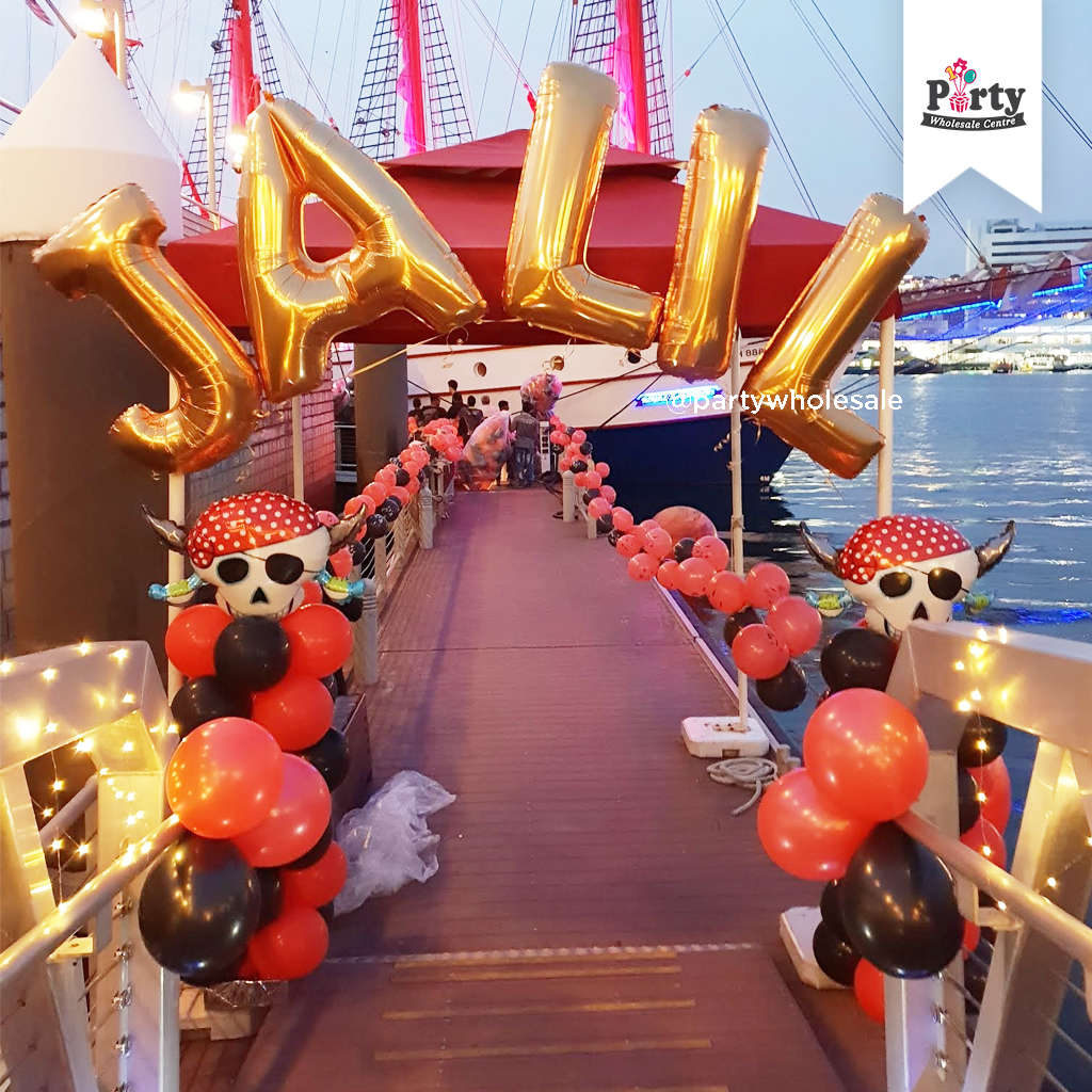 Gold letter balloon arch