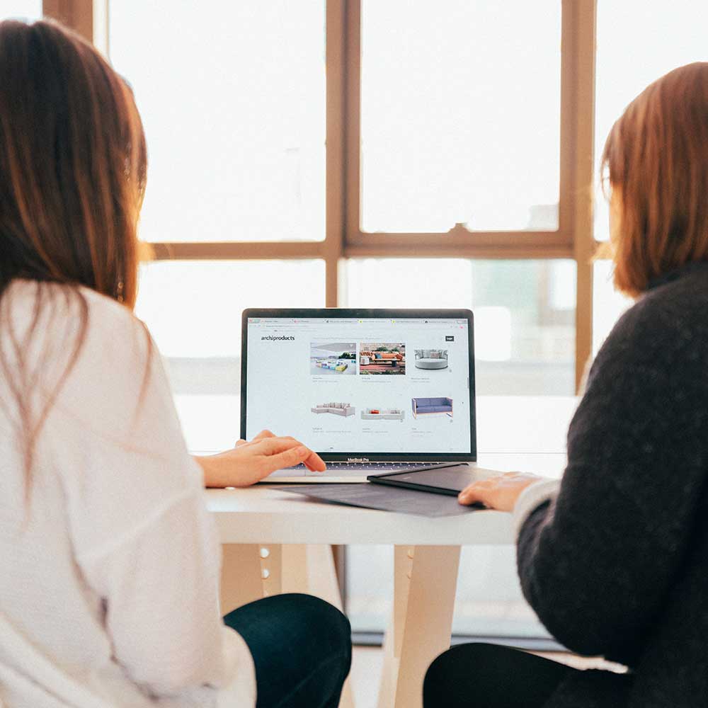 Comverted team working on a fully integrated e-commerce website