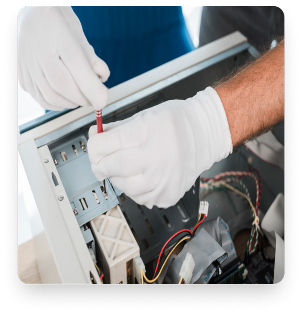 Technician in white gloves servicing internal aircon components