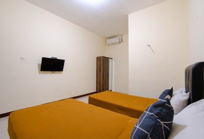 Kost Harian, Mingguan, & Bulanan Athena Syariah Twin Bed Dekat Ke Lapangan Ahmad Yani Tangerang