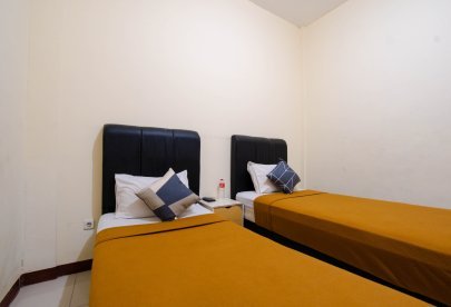 Kost Harian, Mingguan, & Bulanan Athena Syariah Twin Bed Dekat Ke Lapangan Ahmad Yani Tangerang