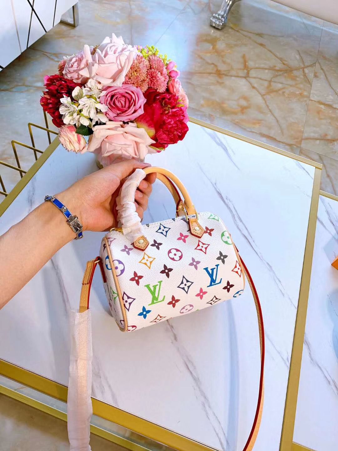 9395-T    LV pillow bag  36$ gallery