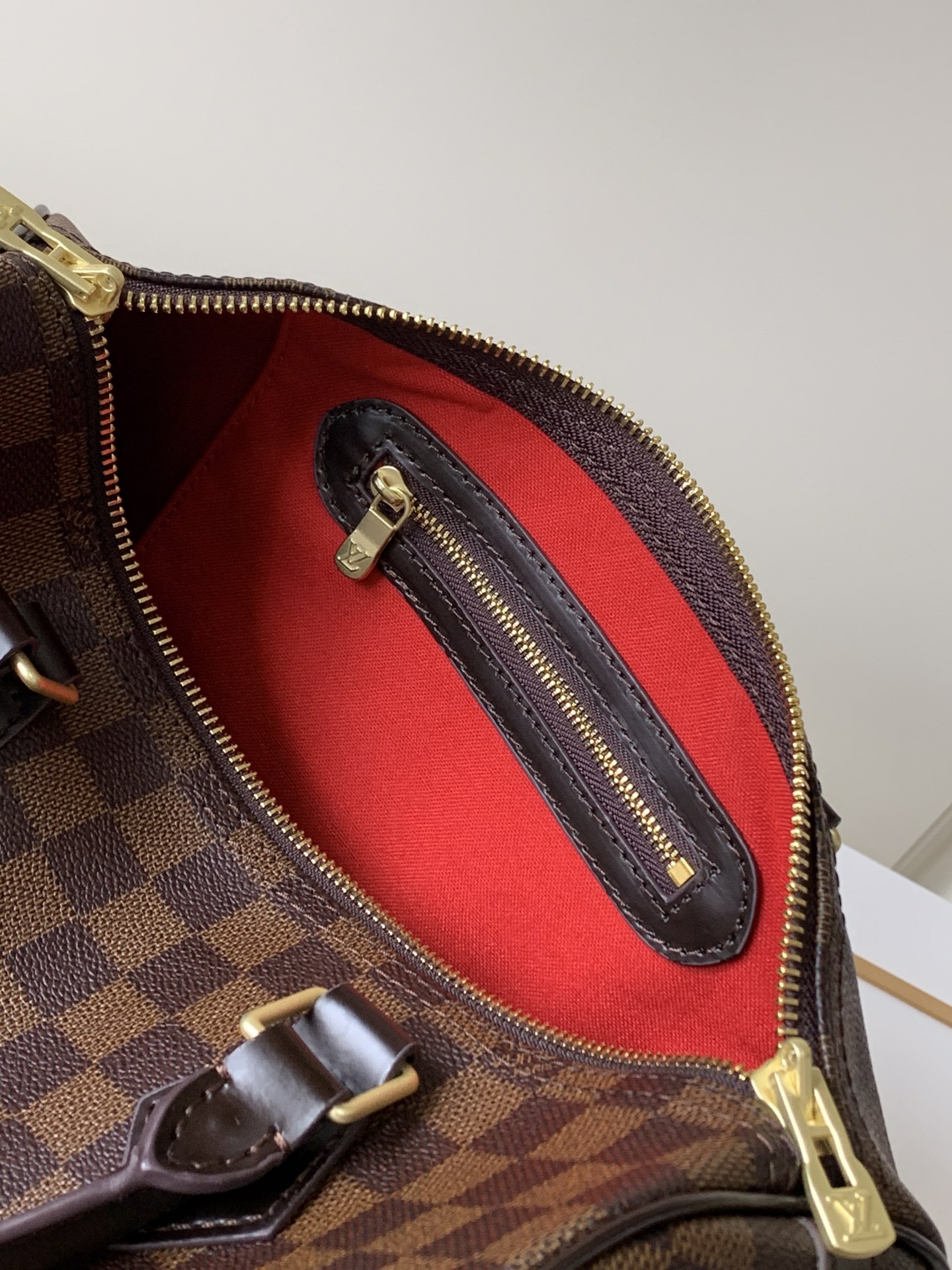 LV $63 gallery