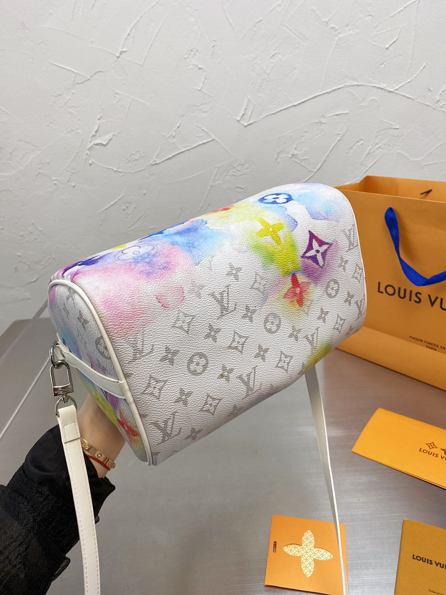 LV $63 gallery