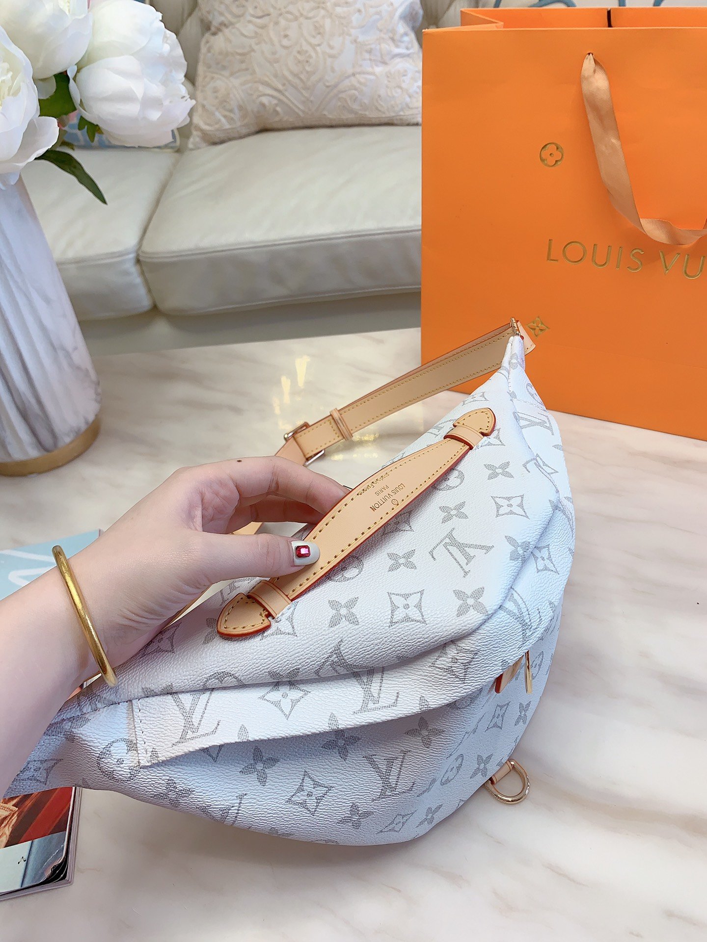 LV $63 gallery