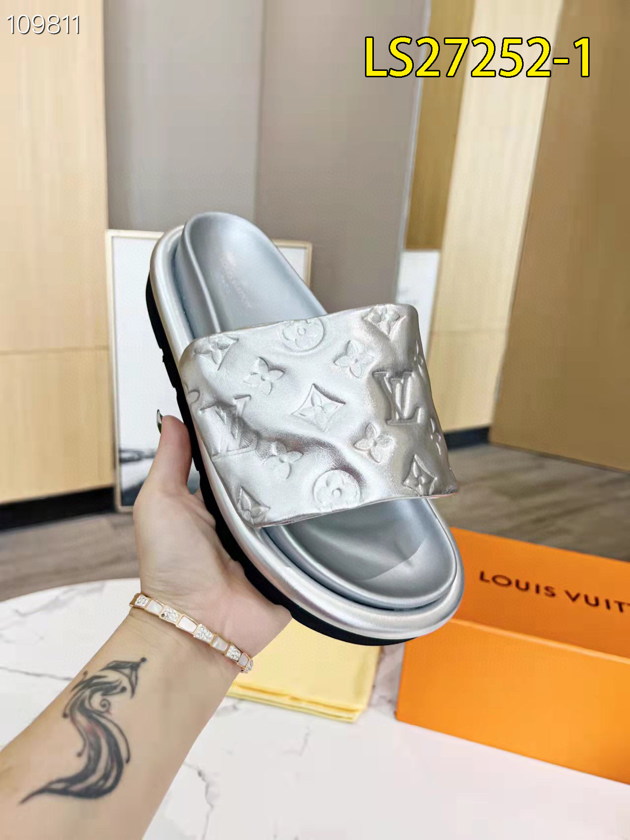 LV $65 gallery