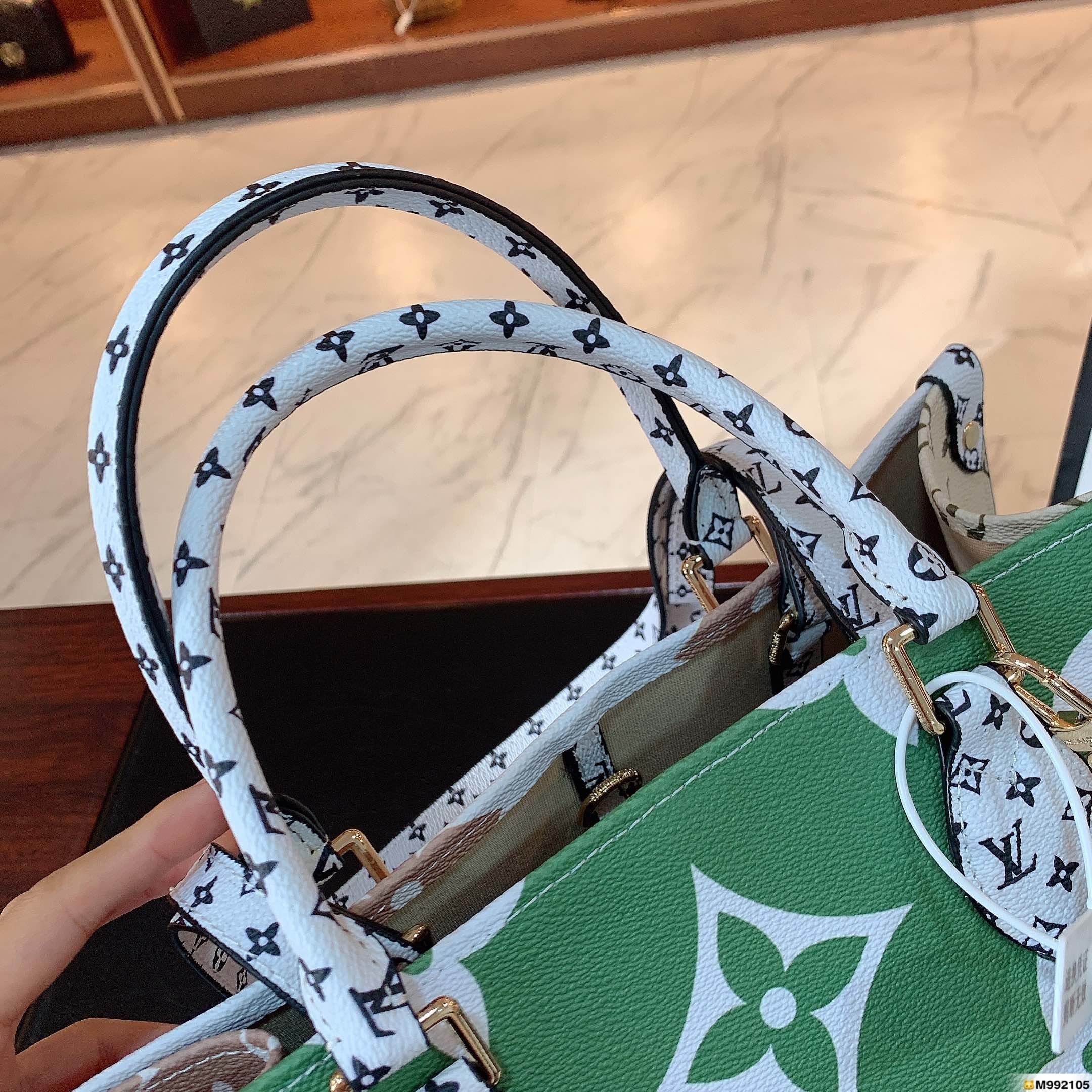 LV $73 gallery