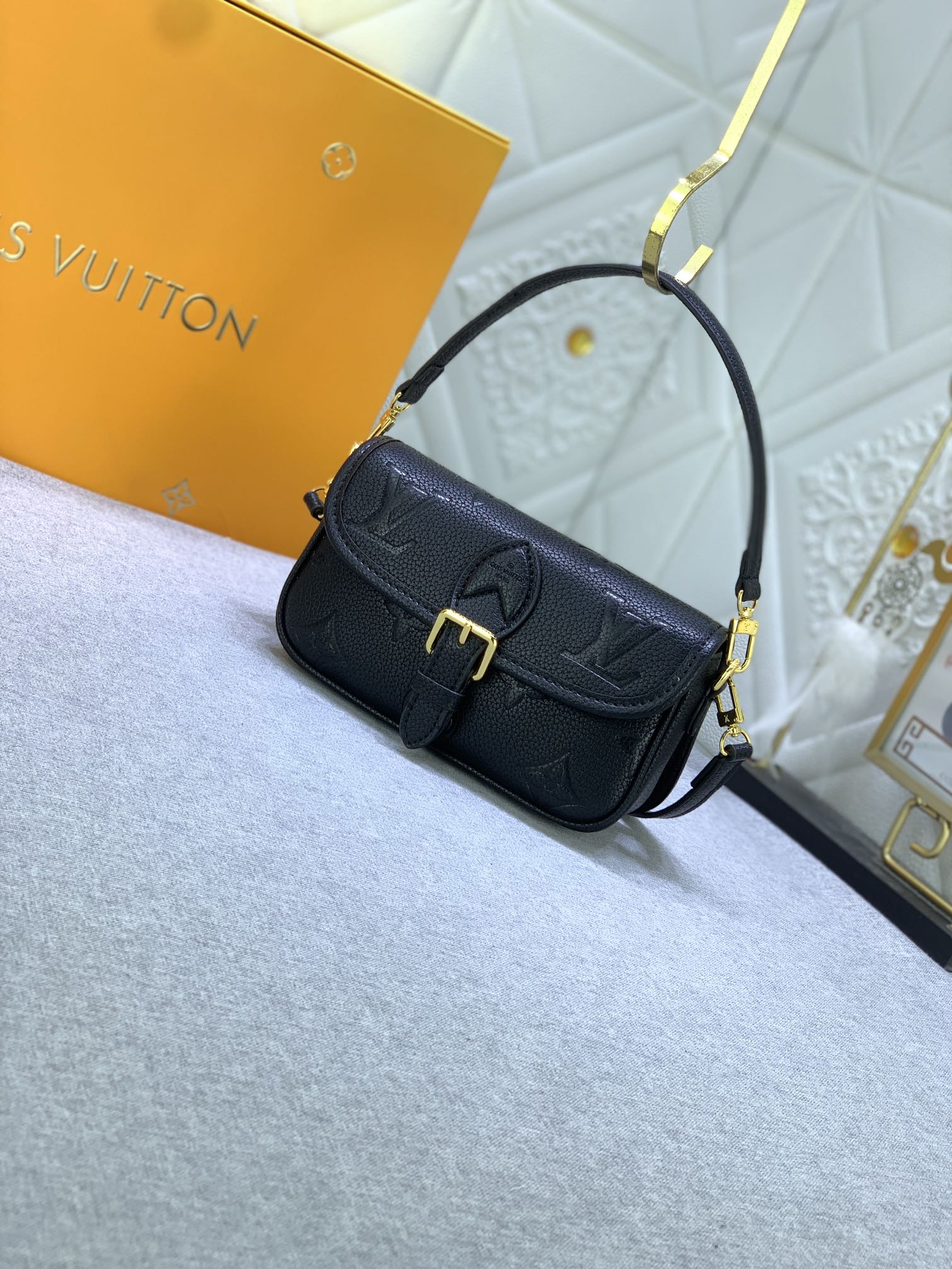 LV $74 gallery