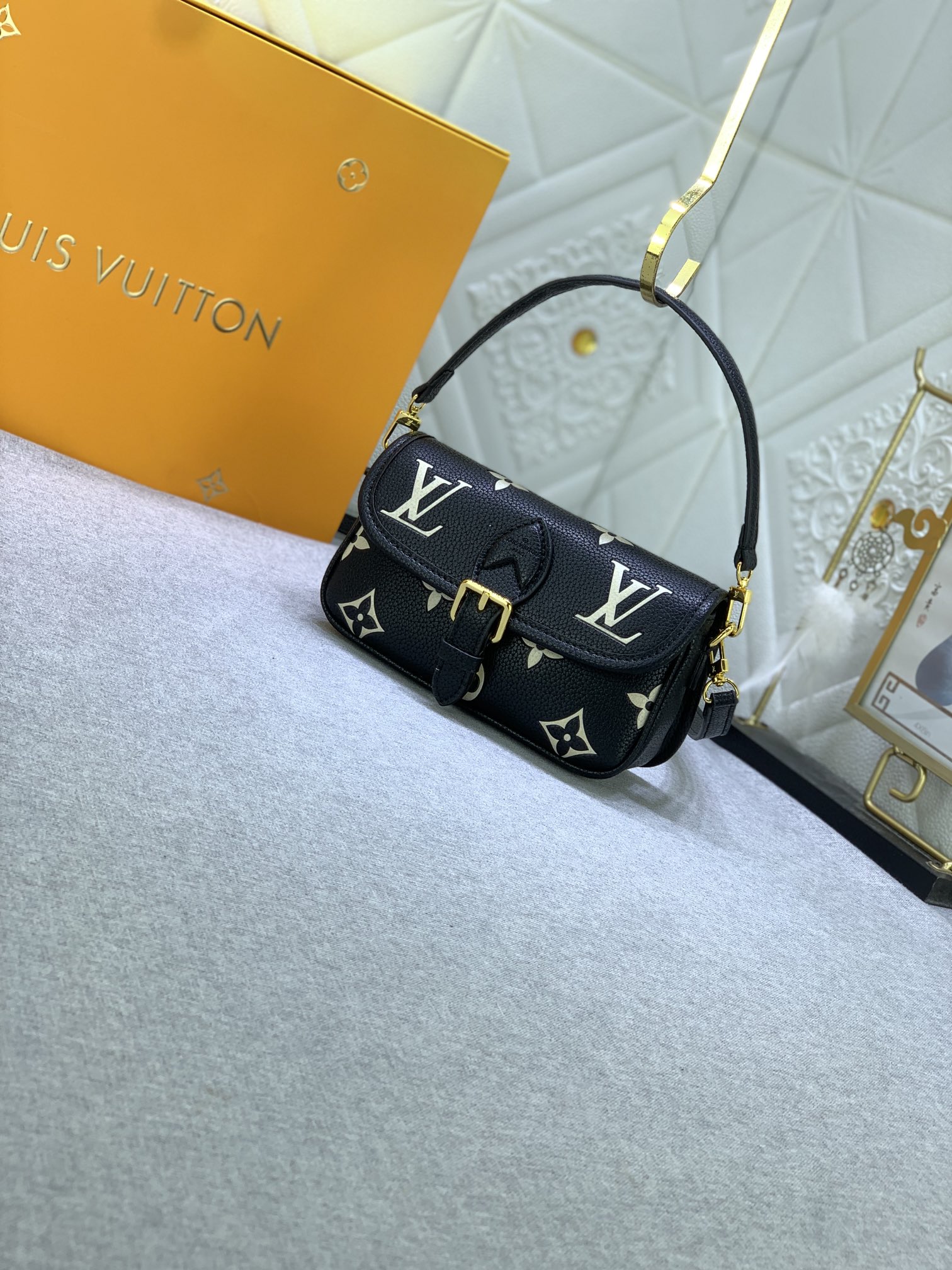 LV $74 gallery