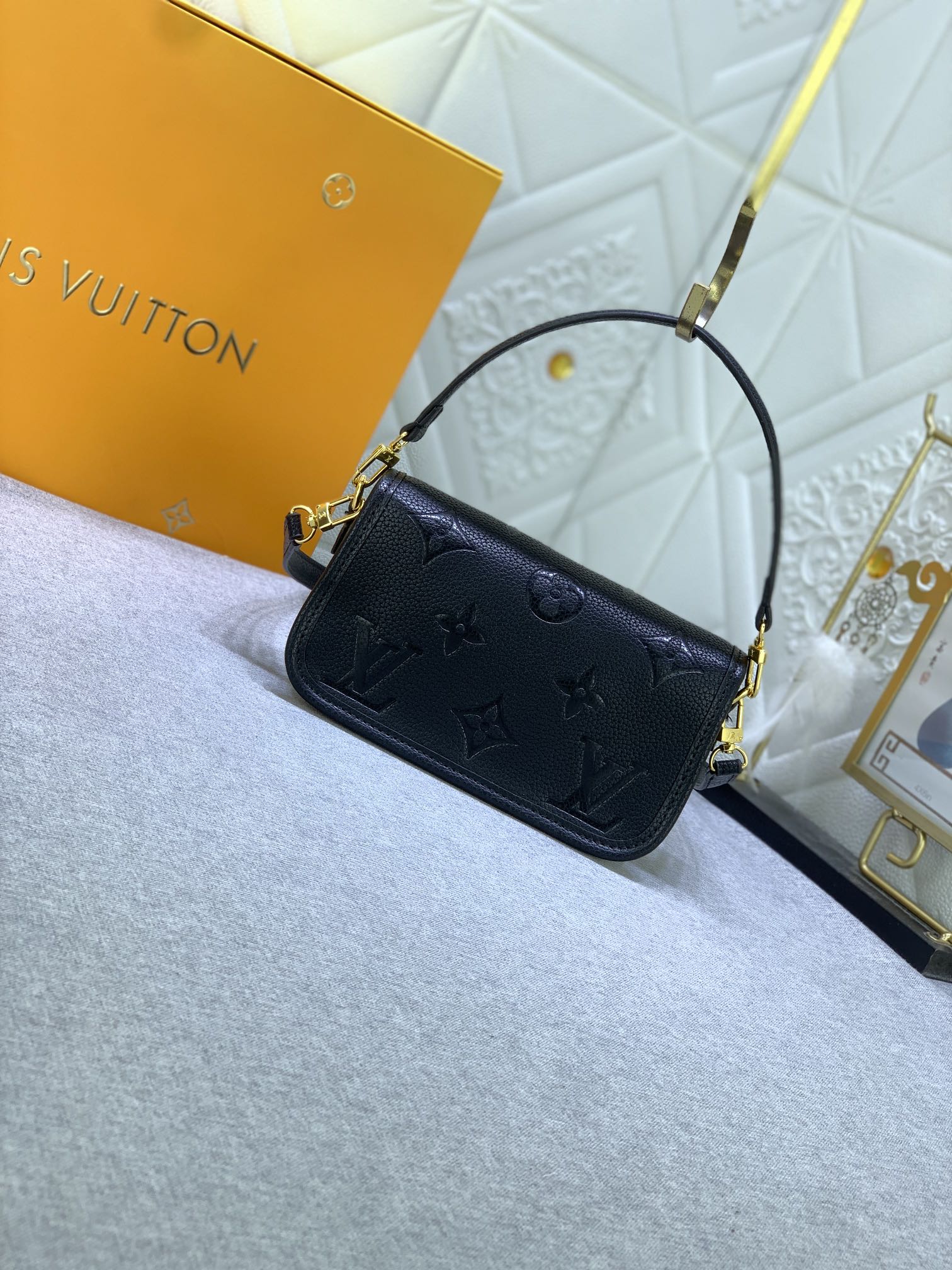 LV $74 gallery