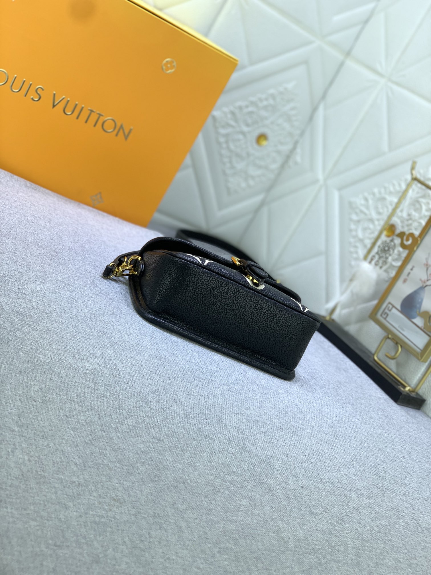 LV $74 gallery