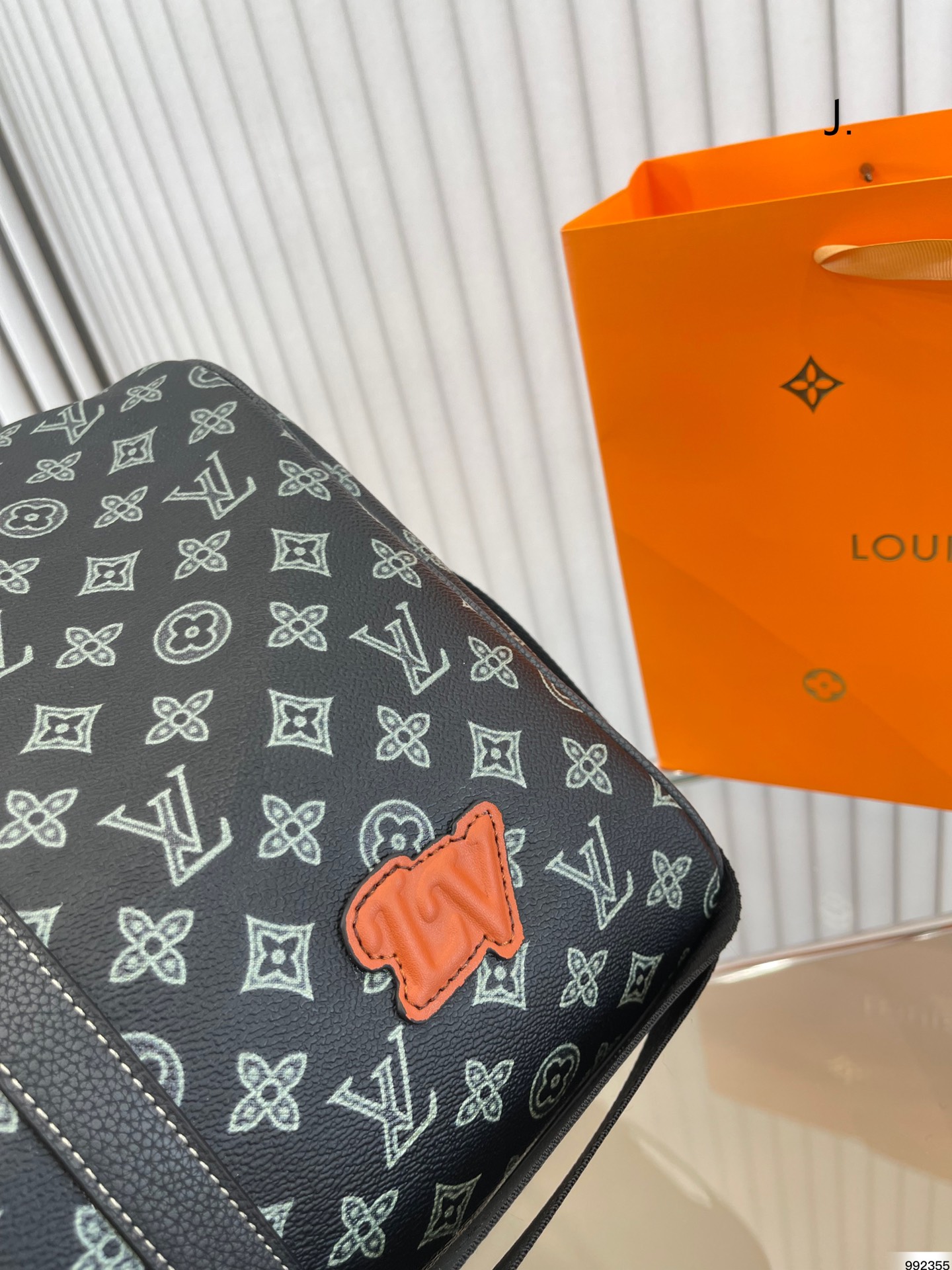 LV $76 gallery