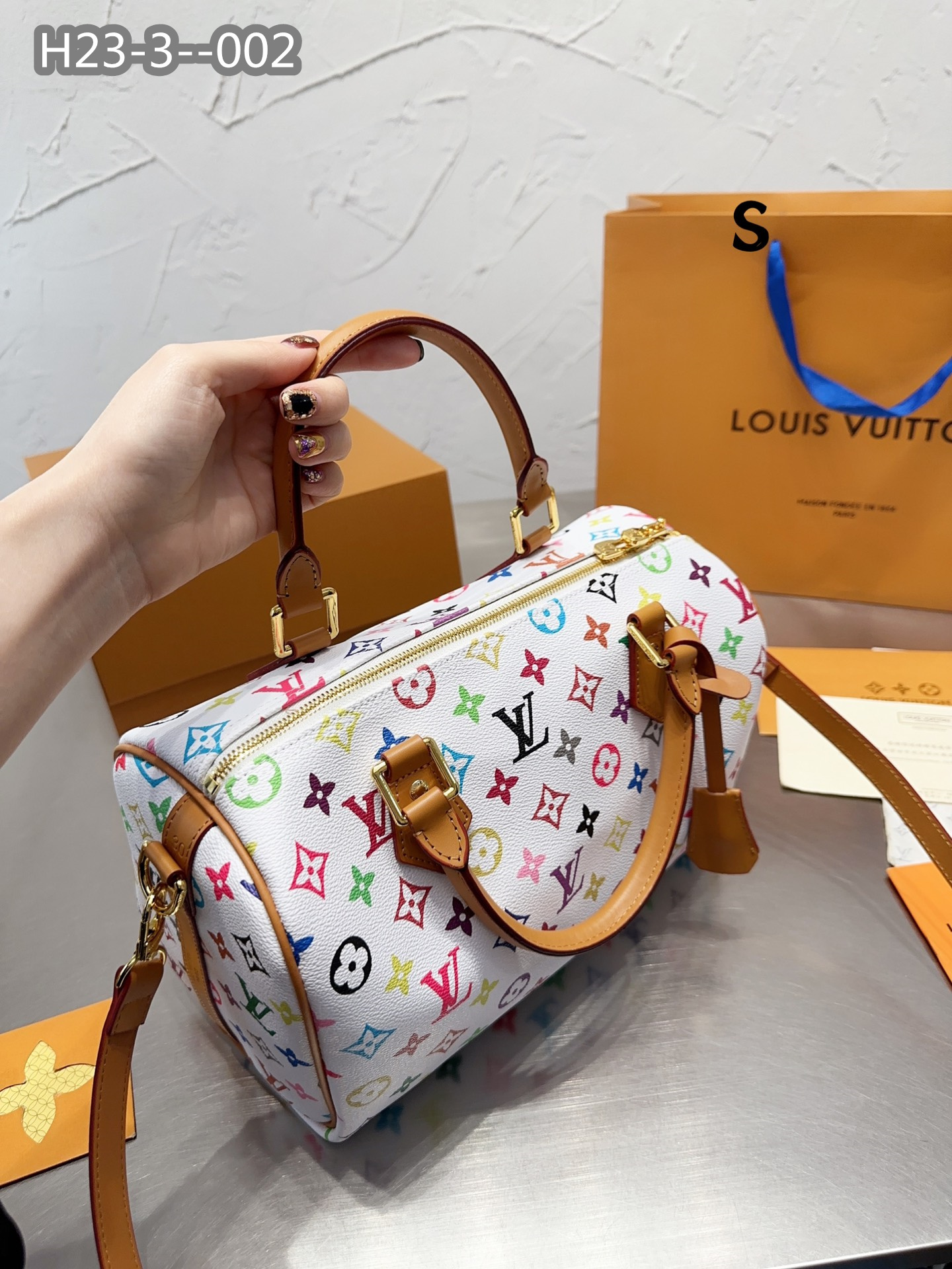 LV $77 gallery