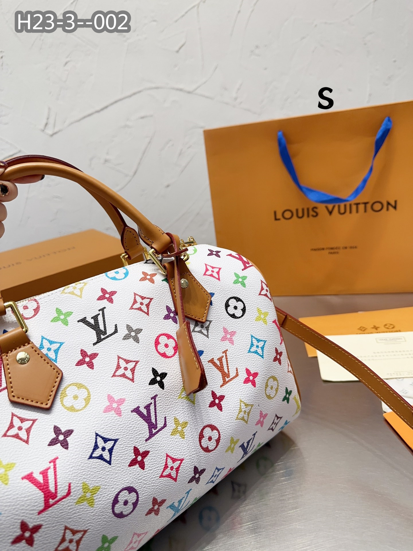 LV $77 gallery