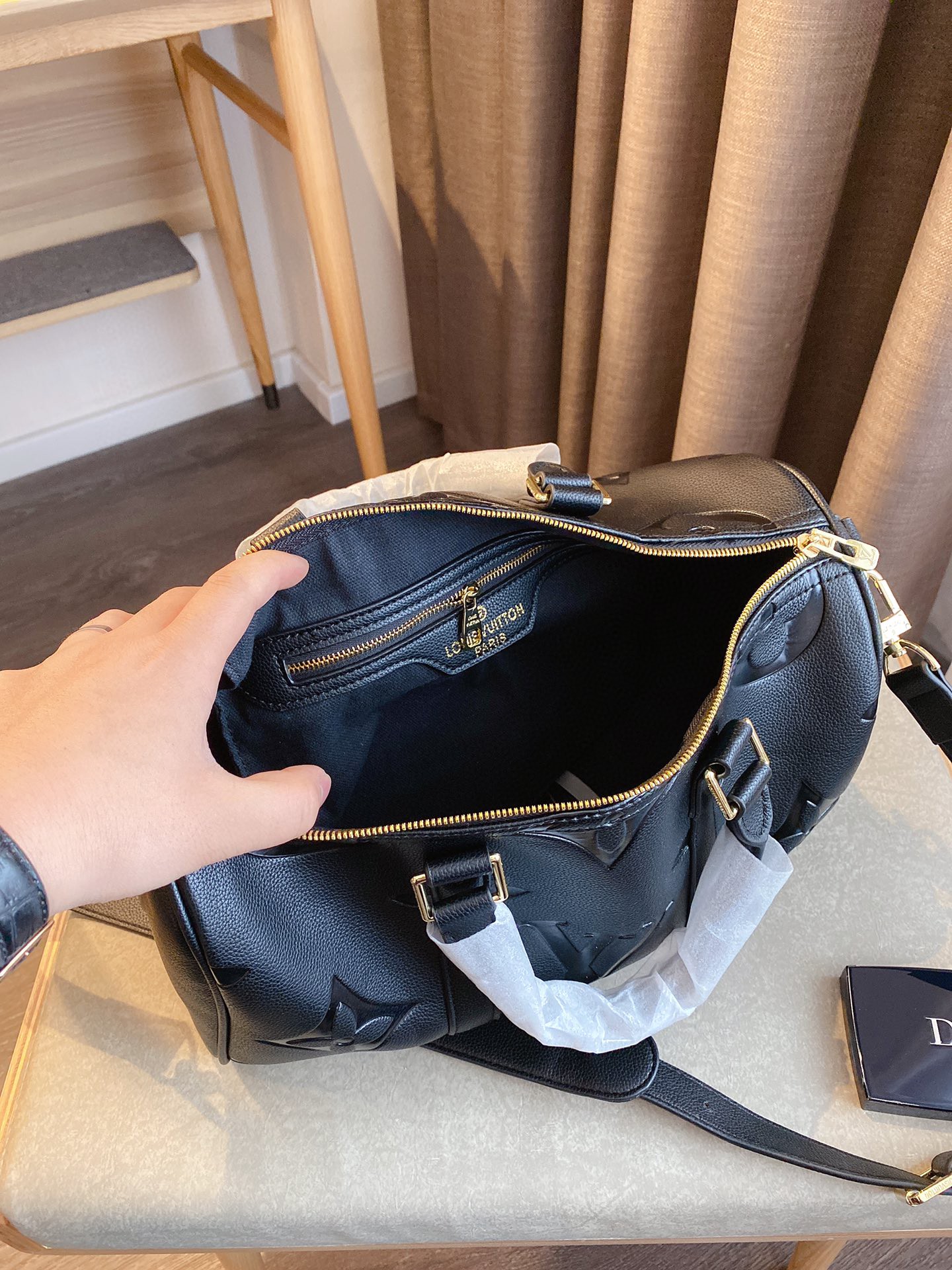 LV $77 gallery