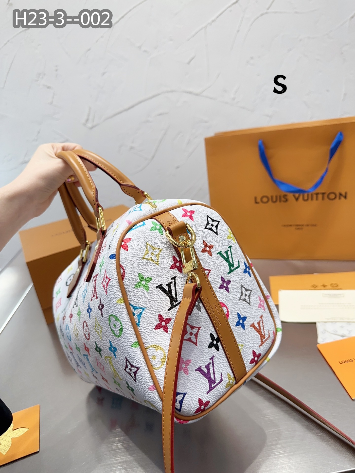 LV $77 gallery