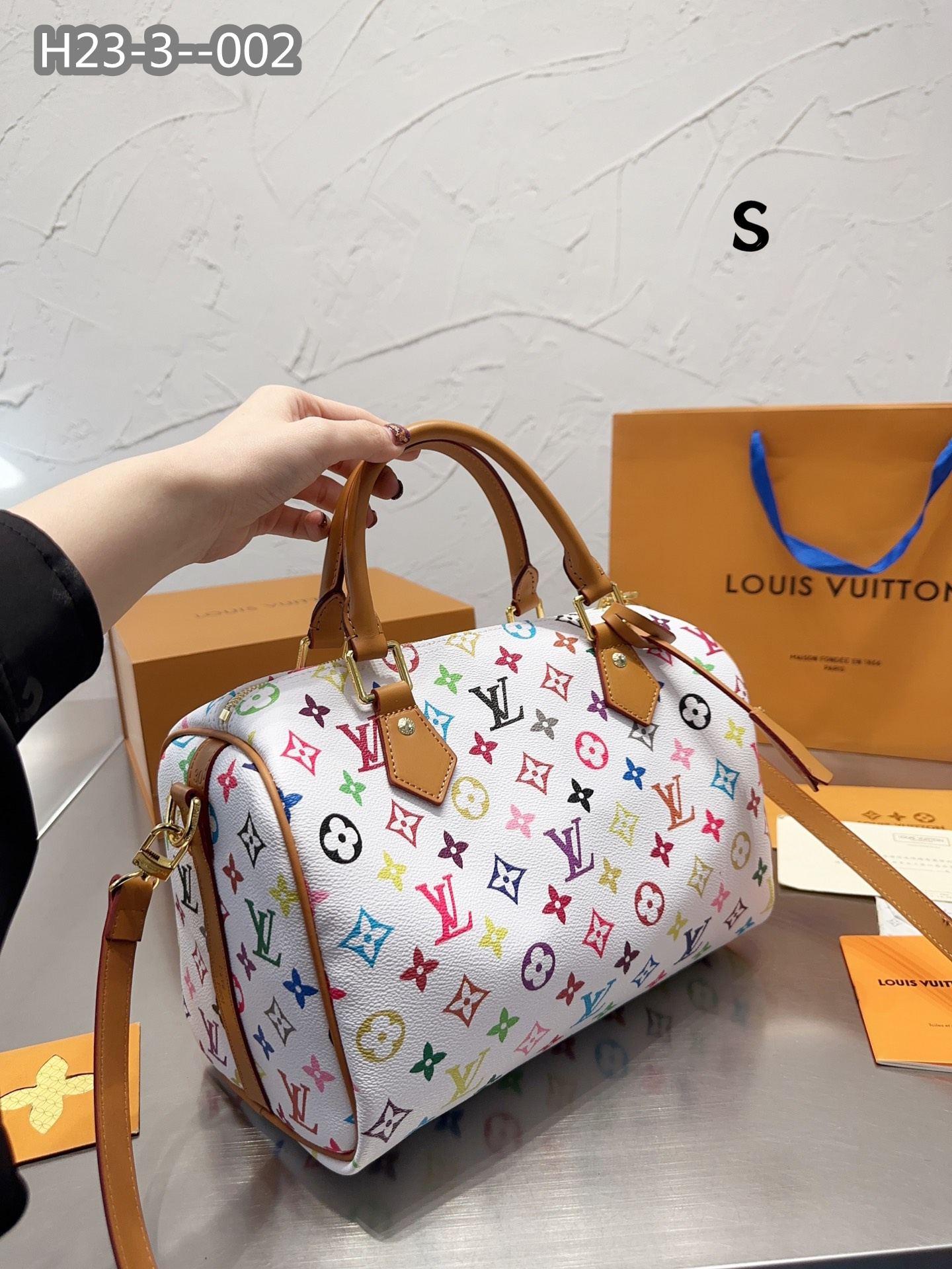 LV $77 gallery