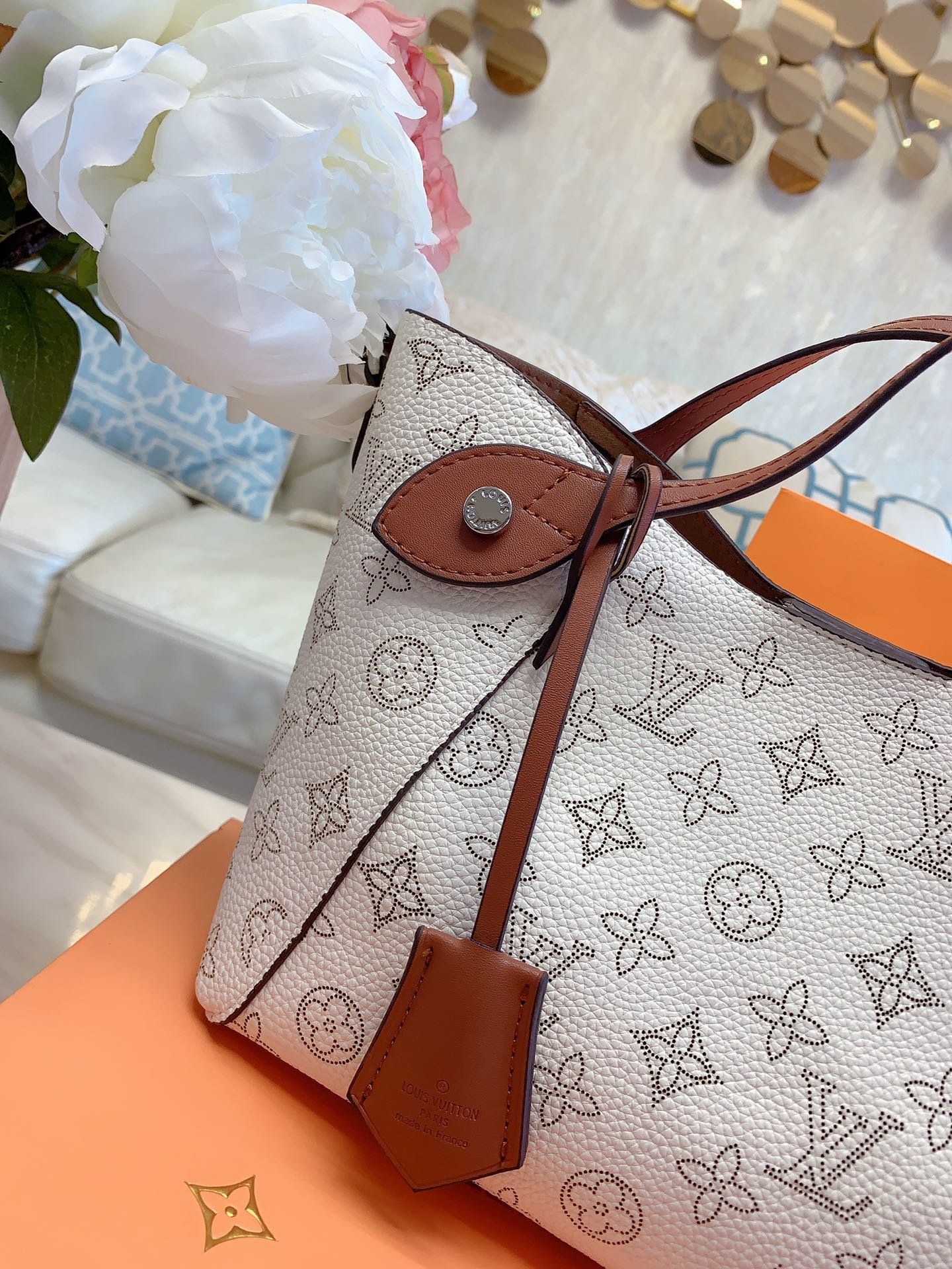 LV $77 gallery