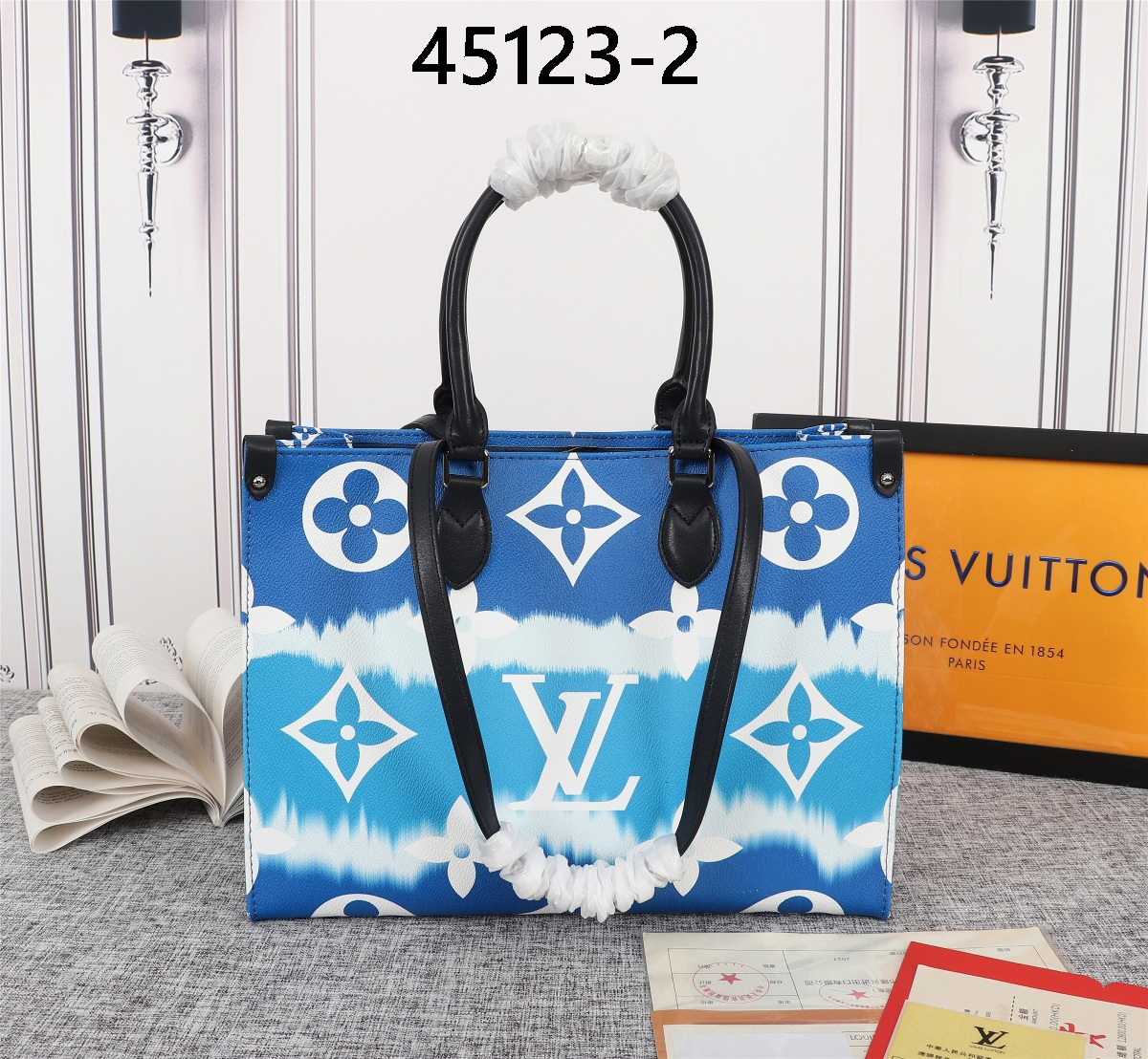 LV $77 gallery