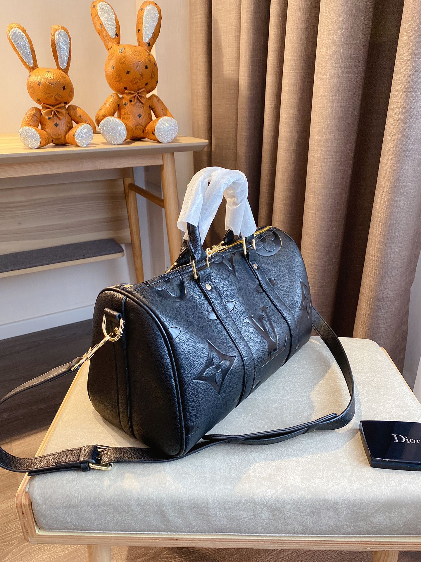 LV $77 gallery