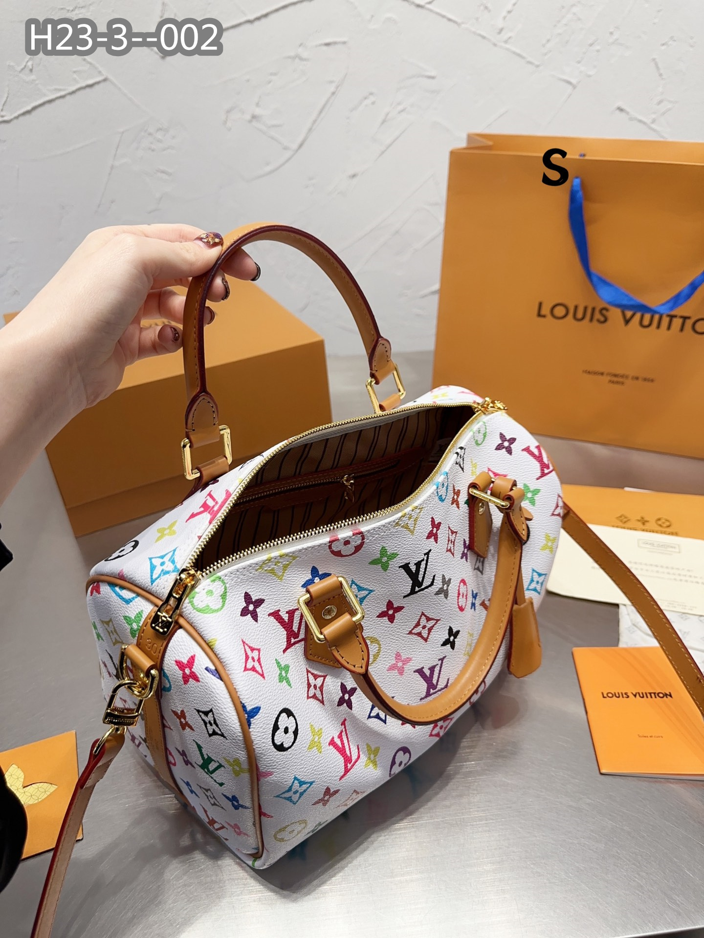 LV $77 gallery