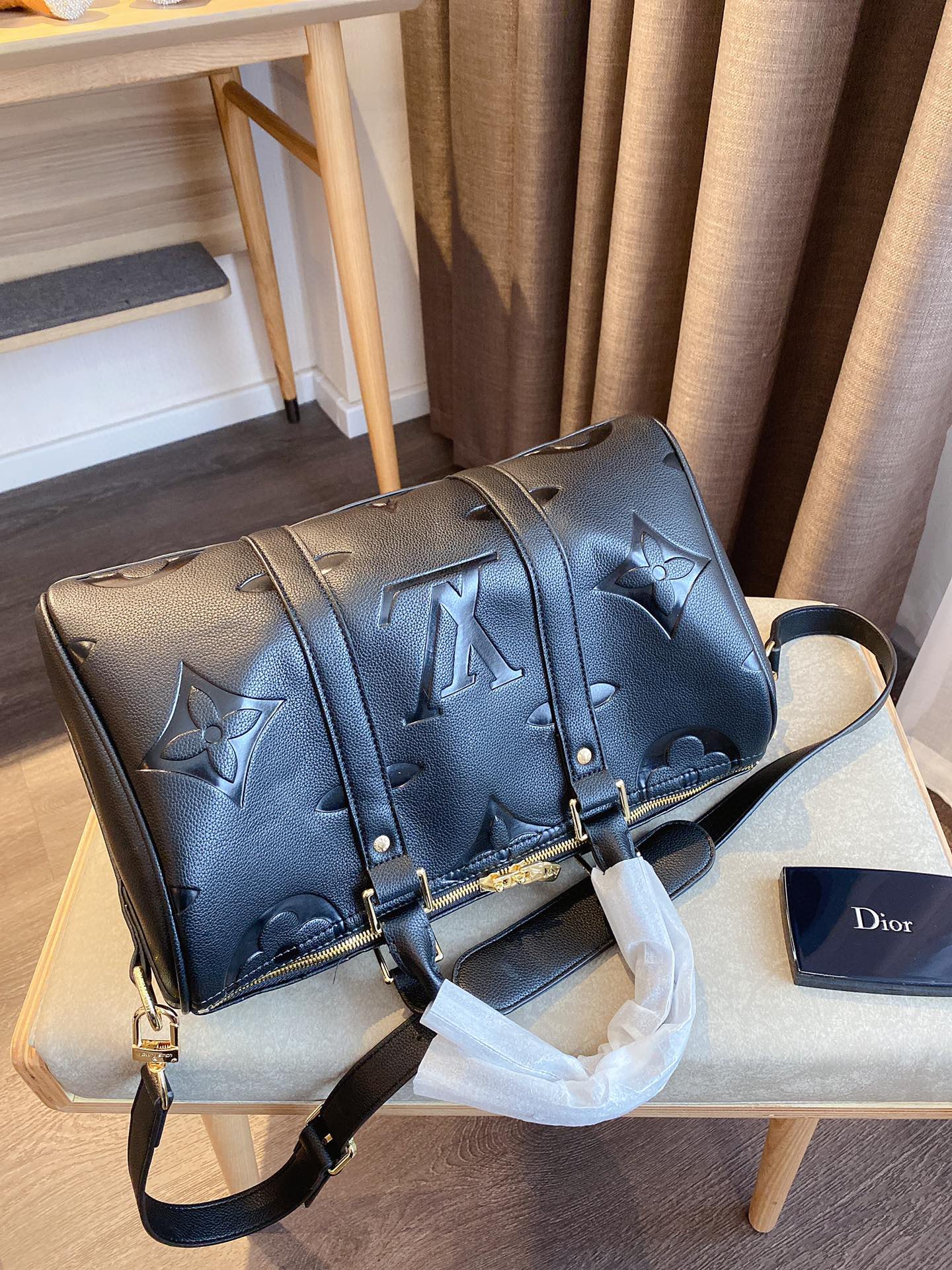 LV $77 gallery