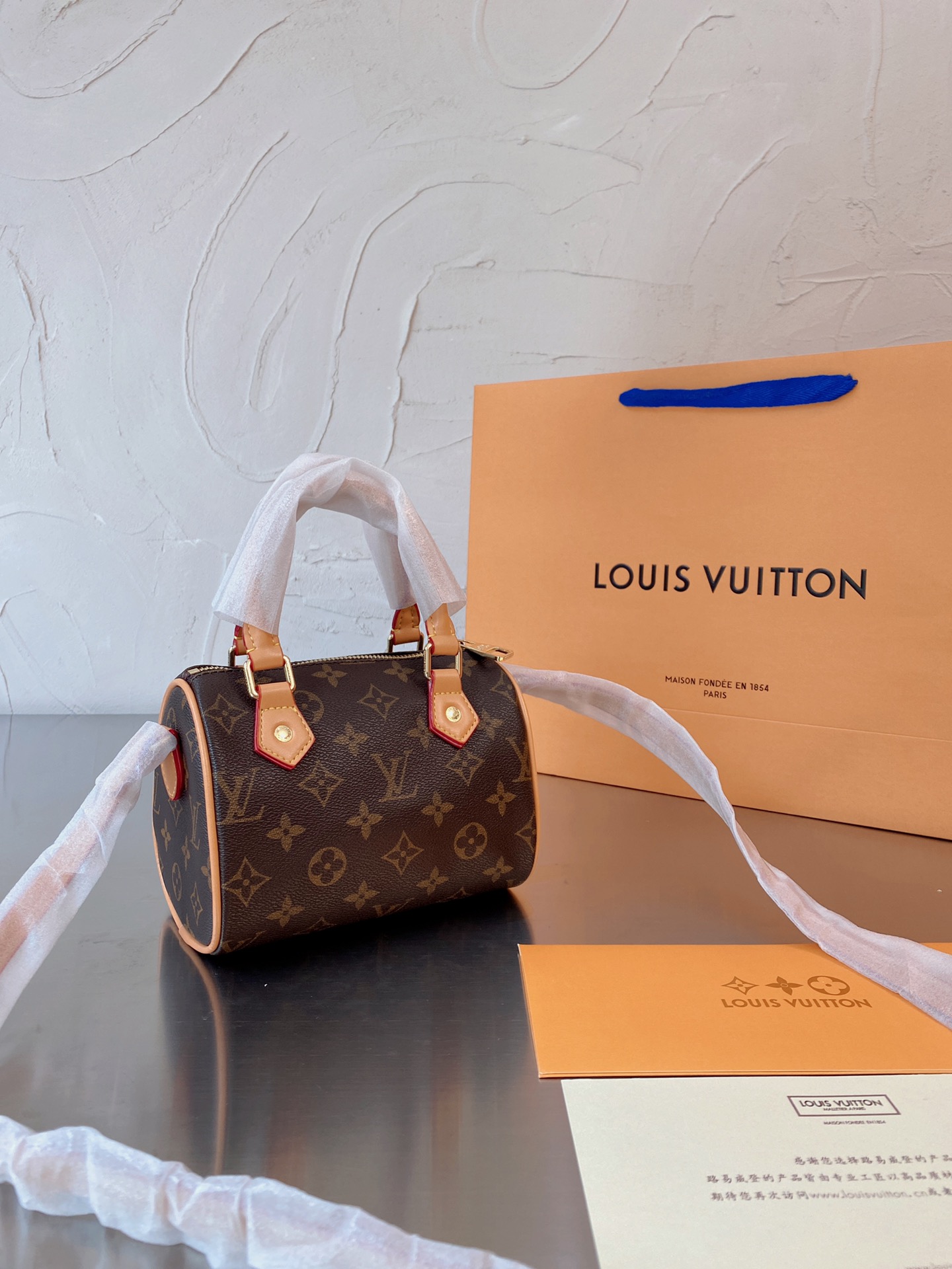 LV $86 gallery