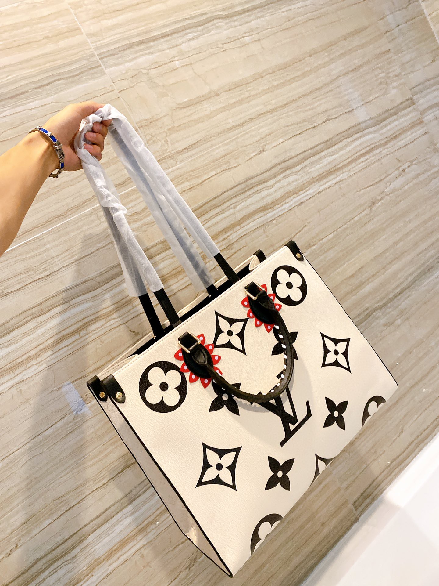 LV $87 gallery