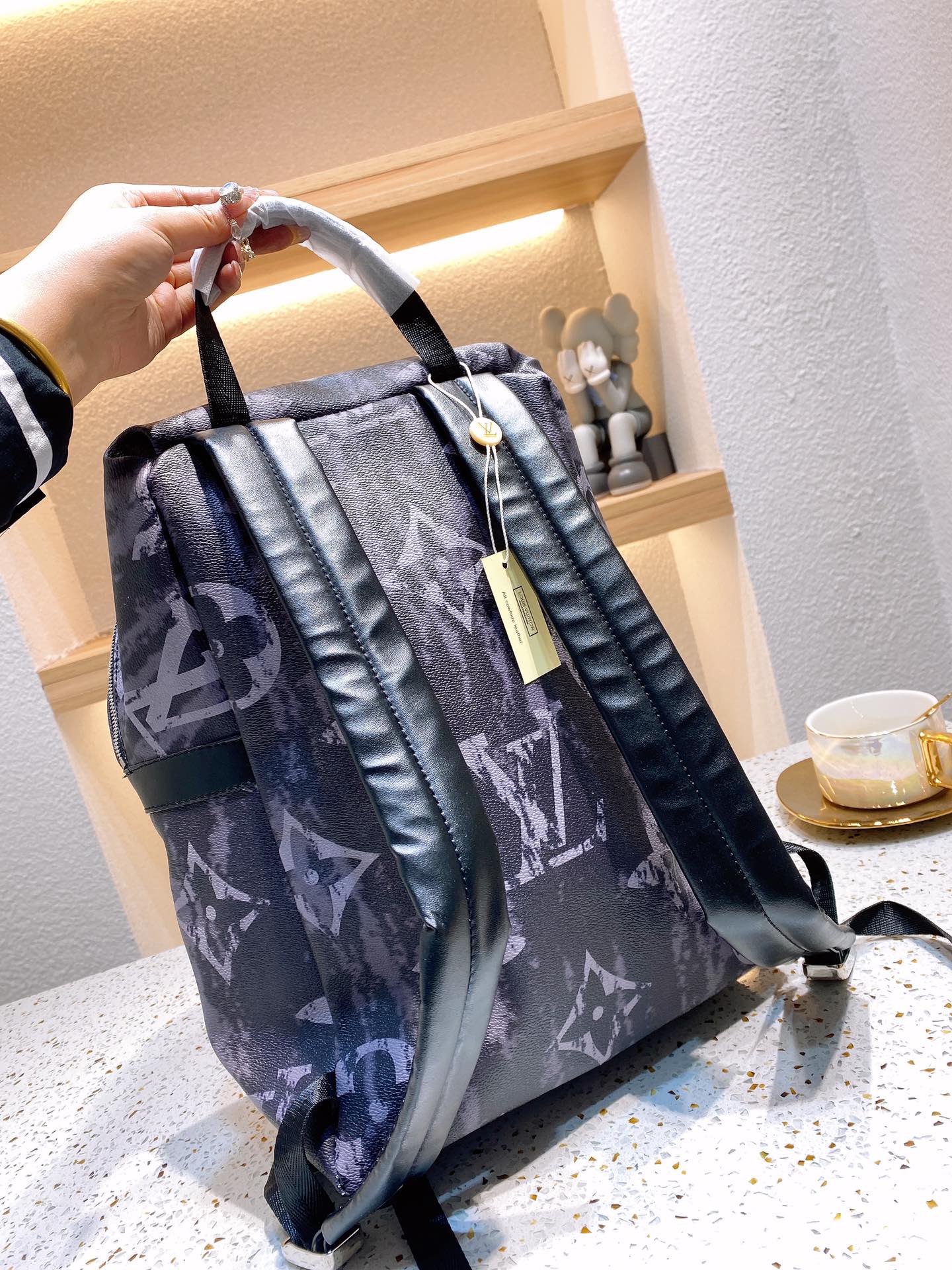 LV $87 gallery