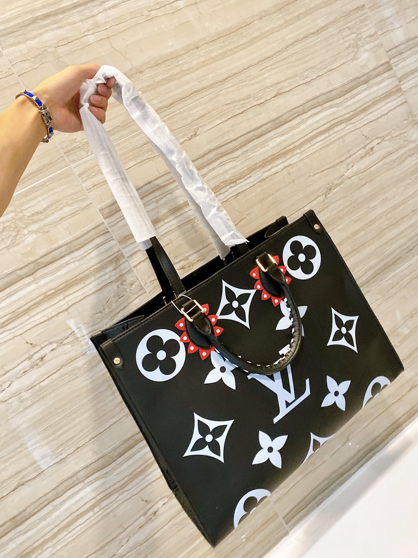 LV $87 gallery