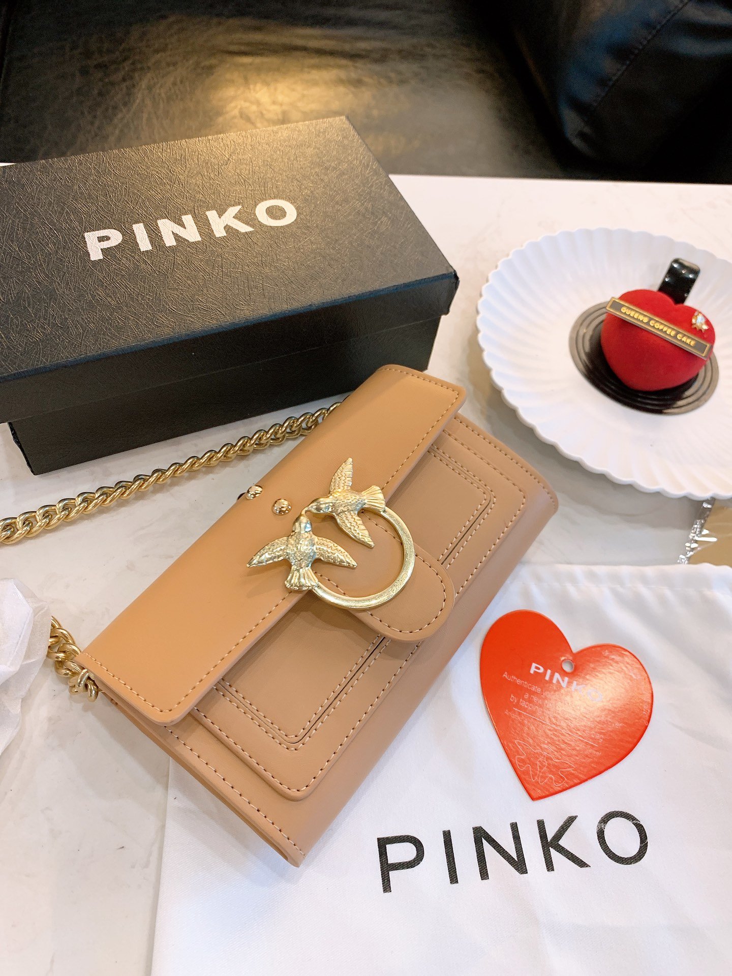 PINKO $60 gallery