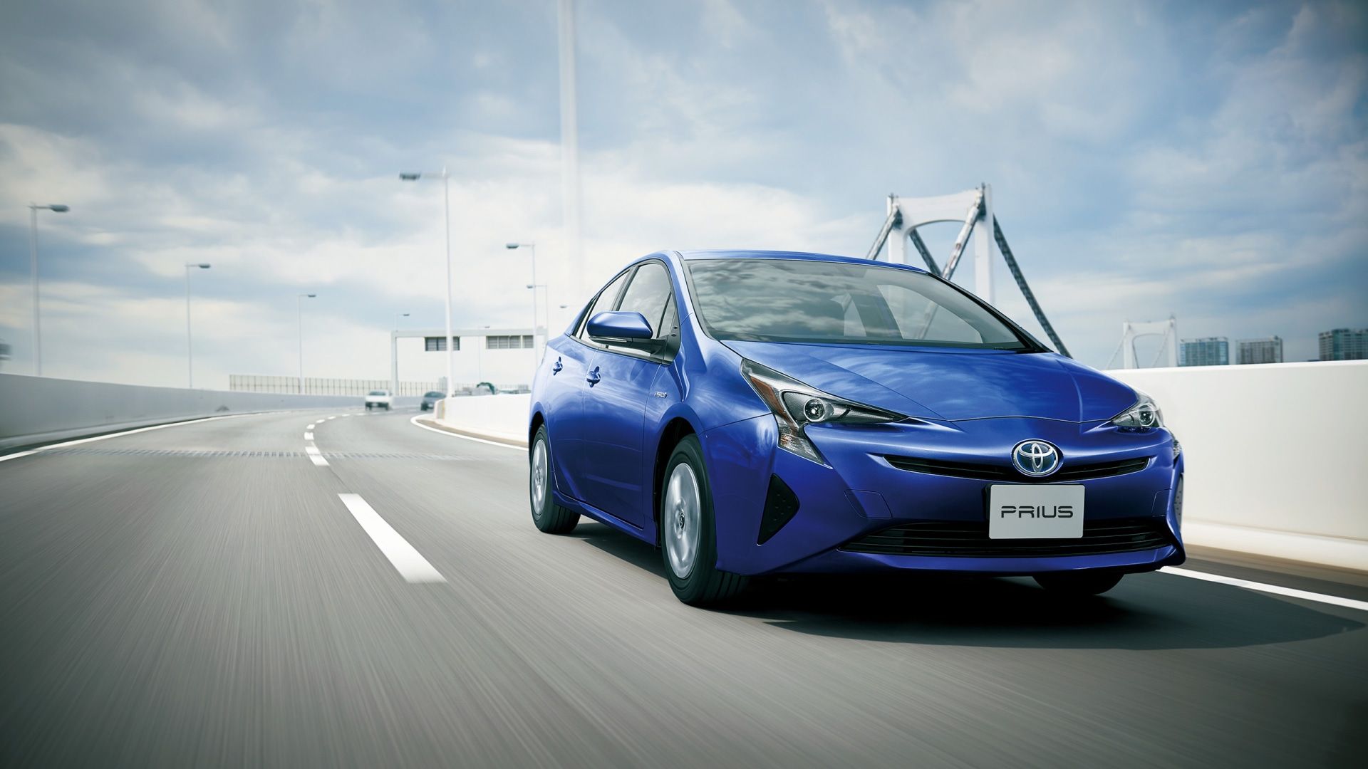 front view of a Toyota Prius on the highway