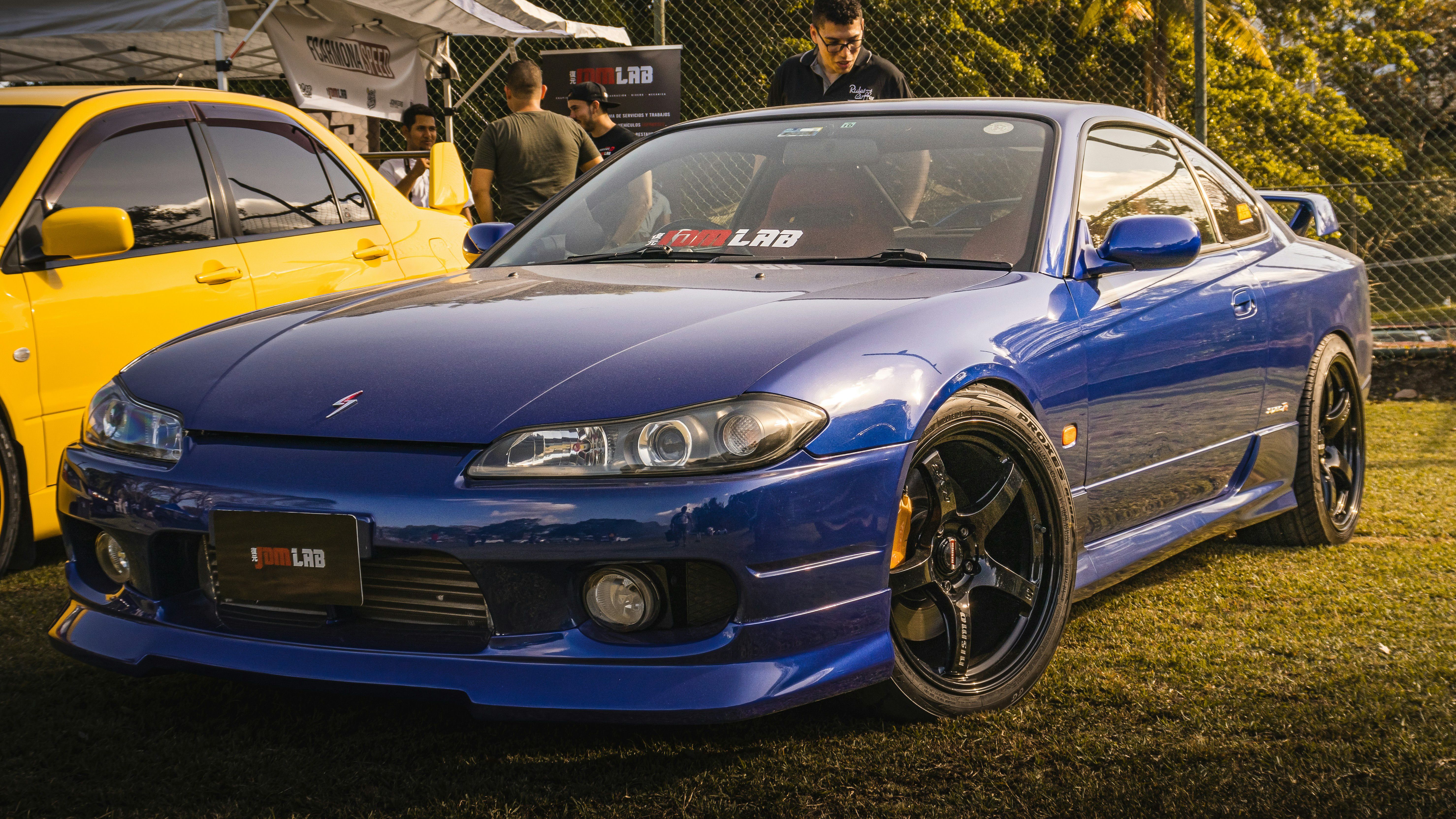 Nissan S15 parked in car show.