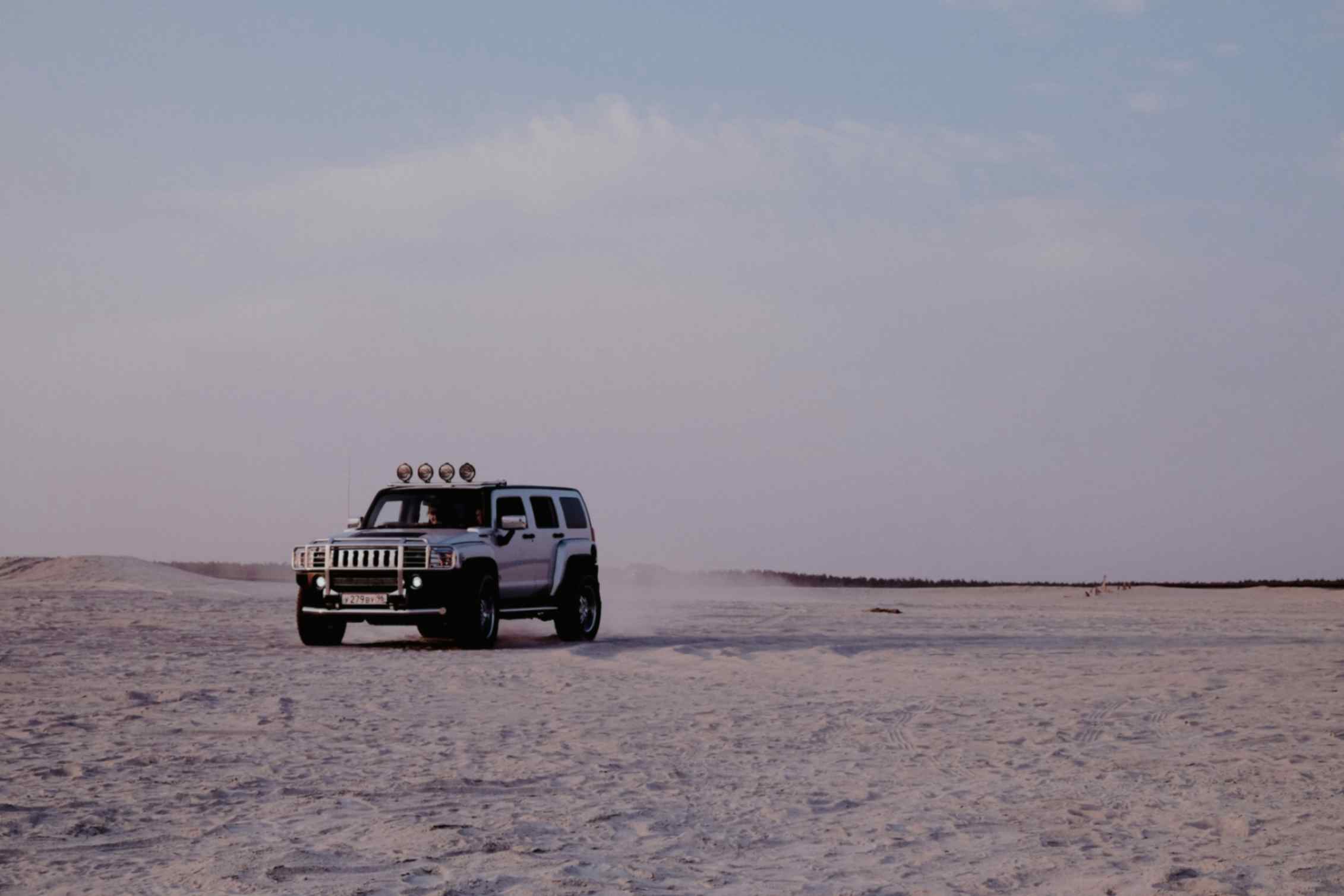 hummer in the desert or beach